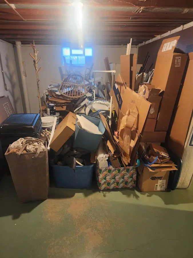 Roll-off dumpster container at job site for 15 Yard Dumpster Rental in Shelton